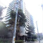 ファミール江波公園ツインズ弐番館　外観。13階建てマンションの上層階です。